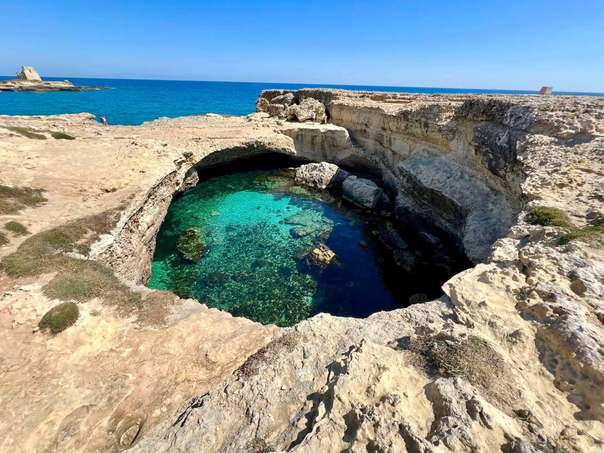 Turquoise sea cove with limestone cliffs near Otranto, Salento